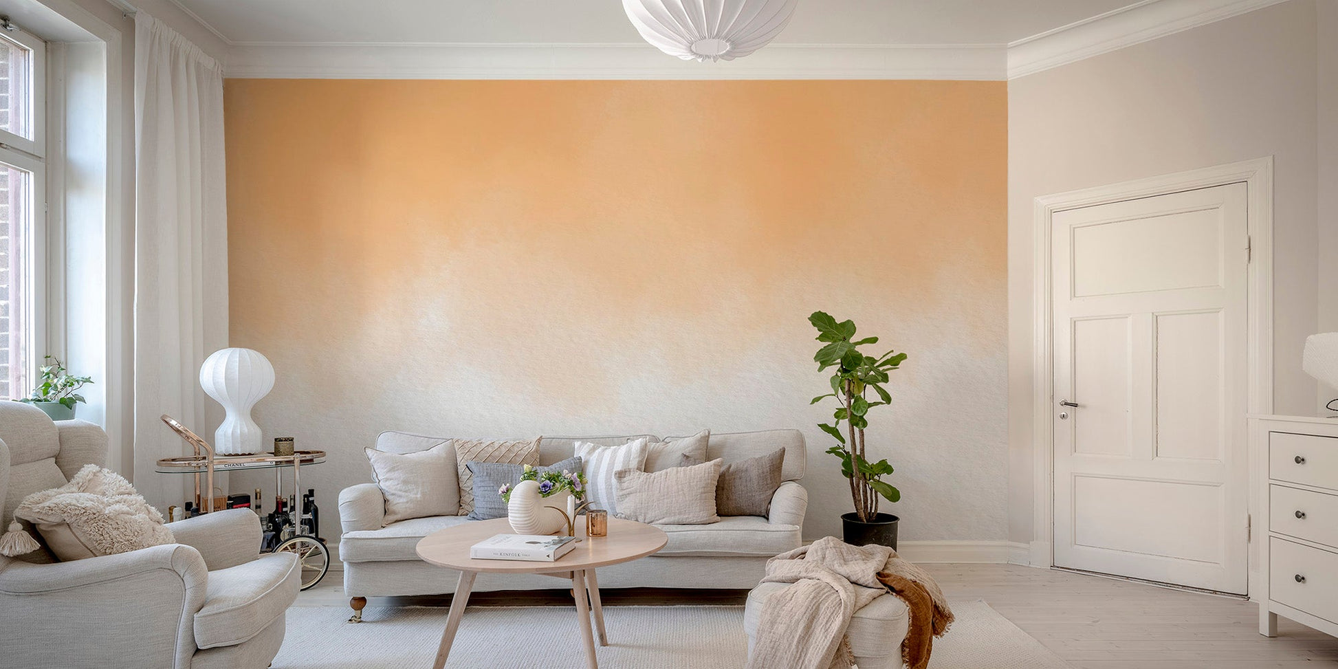 Golden hour watercolor wall mural in soft blended shades.