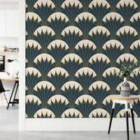 Symmetrical gold line wallpaper behind a minimalist office desk setup