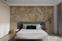 Tropical beige wall mural with metallic gold leaf patterns for sunlit bedroom.