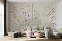 Large scale golden sun wall mural with central orb and gold light rays.