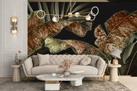 Living space with a cream sofa and textured tropical plant wall mural.
