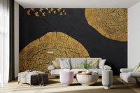 Artistic golden mural with butterfly and wood motifs.