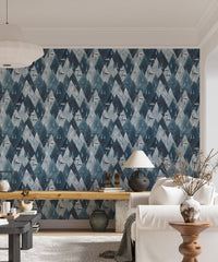 Navy blue mountain wallpaper for living room feature wall and wooden stool.