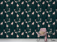 Vibrant tropical wallpaper with rich pink flamingo patterns in nursery.