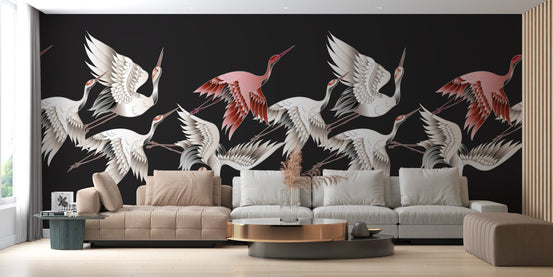Elegant living room wall mural with large crane motifs behind a neutral sofa.