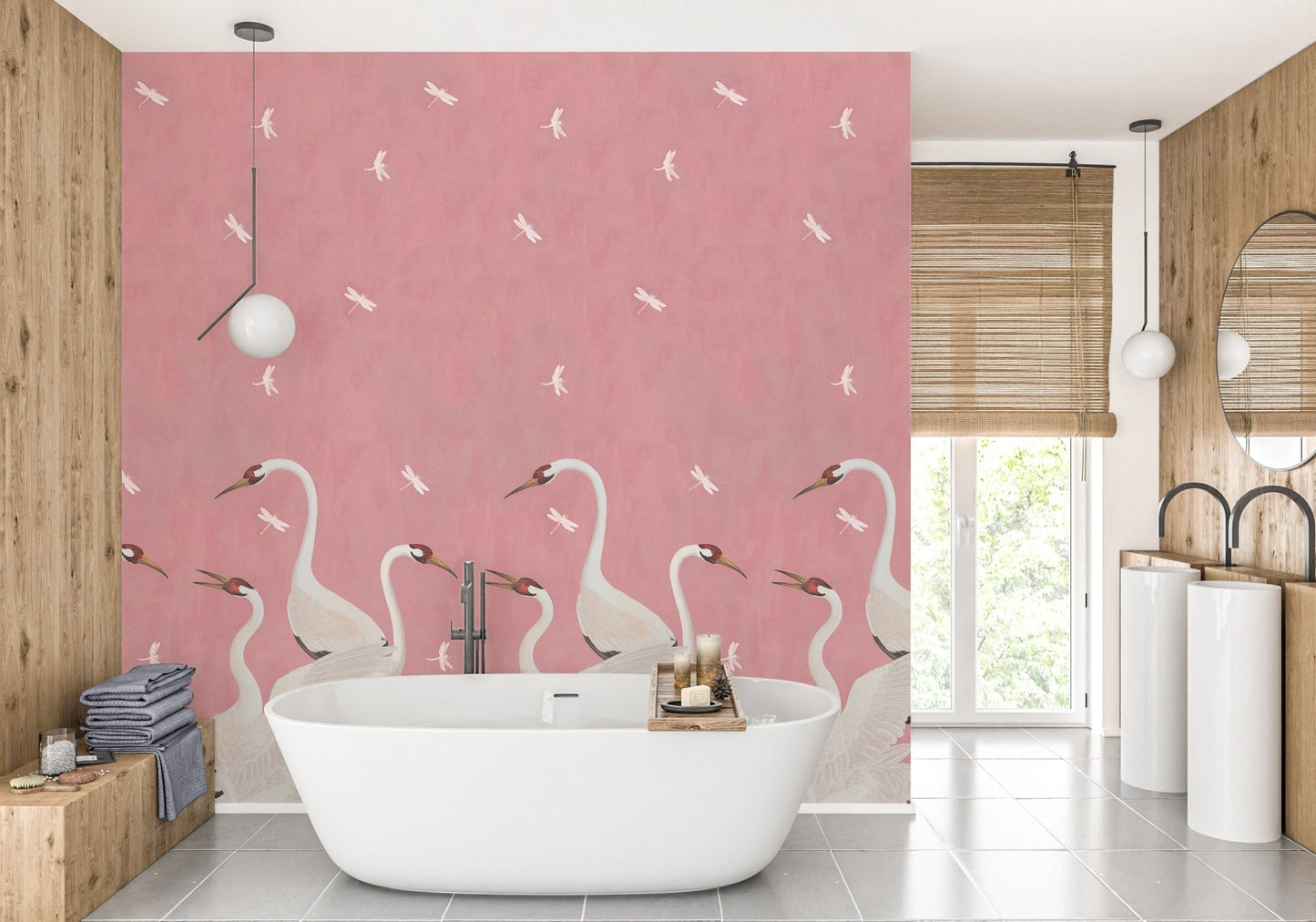 Modern bathroom with pink sakura wall mural and a white freestanding tub.