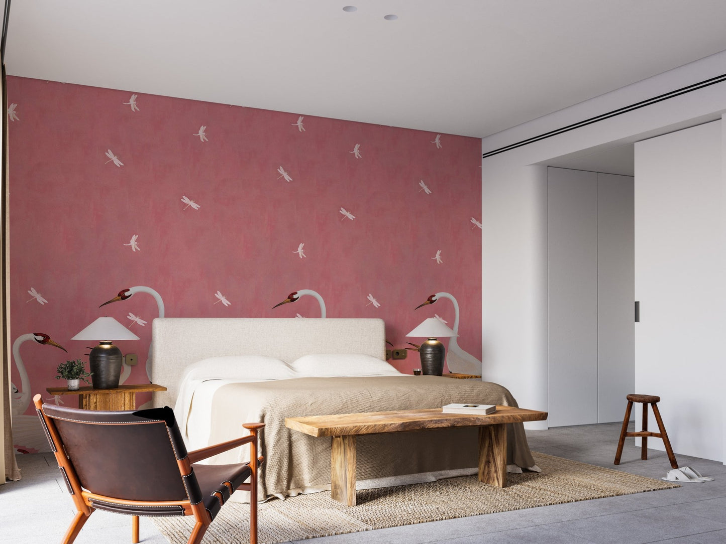 Pink soar wall mural used as a backdrop for a large beige bed.