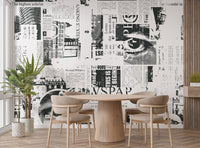 Abstract newsprint wallpaper mural with mixed text overlays.