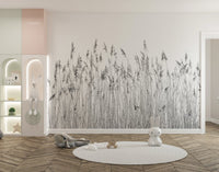Canebrake wall mural in a playroom with a white circular rug and storage units.