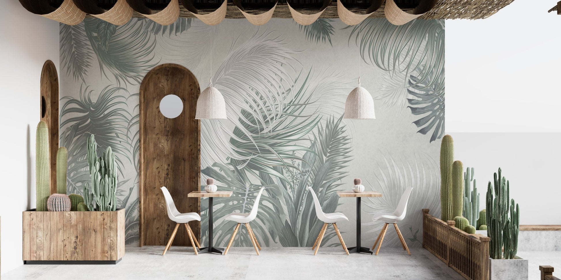 Tropical palm leaves wall mural in a minimalist cafe setting with arch decor.