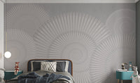 Concentric circle wall mural in light grey and charcoal tones for kids bedroom.