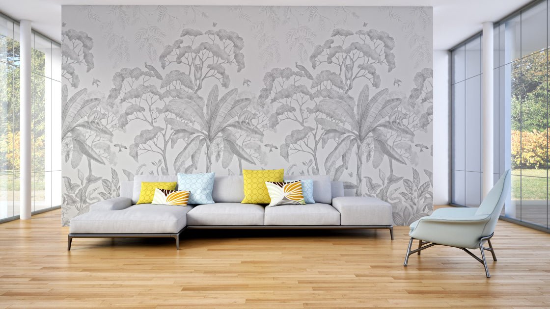 Grayscale palm and tropical leaf wall mural for open plan living room.