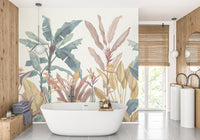 White bathroom featuring a freestanding tub and tropical botanical exotica wall mural.