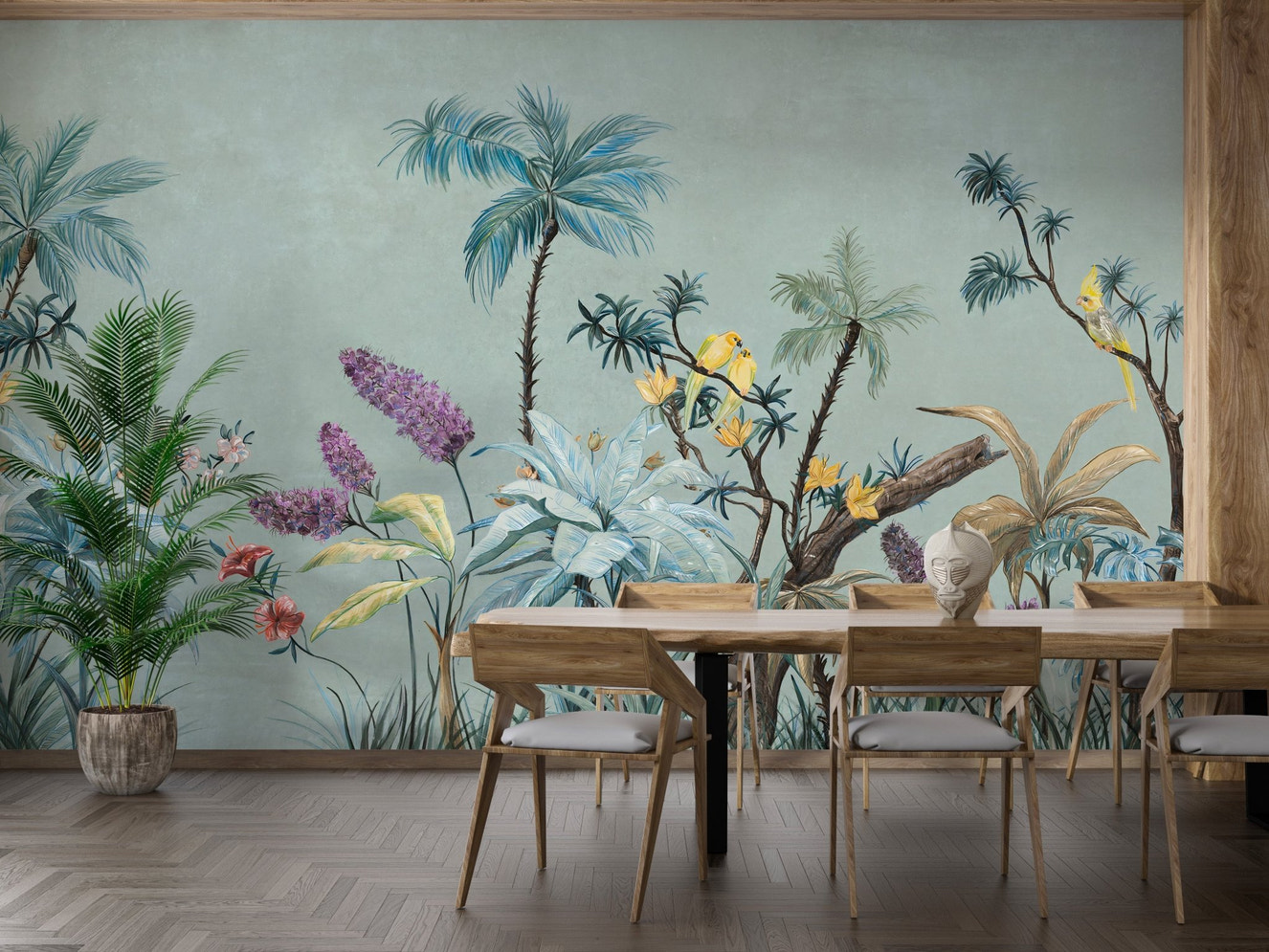Dining area featuring green tropical wall mural and light wood chairs.