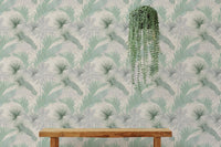 Green Banana Leaves Seamless Pattern Wallpaper behind a wooden bench and hanging plant.