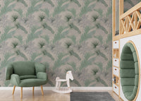 Leafy pattern wallpaper in a playroom with a green armchair and toy horse.