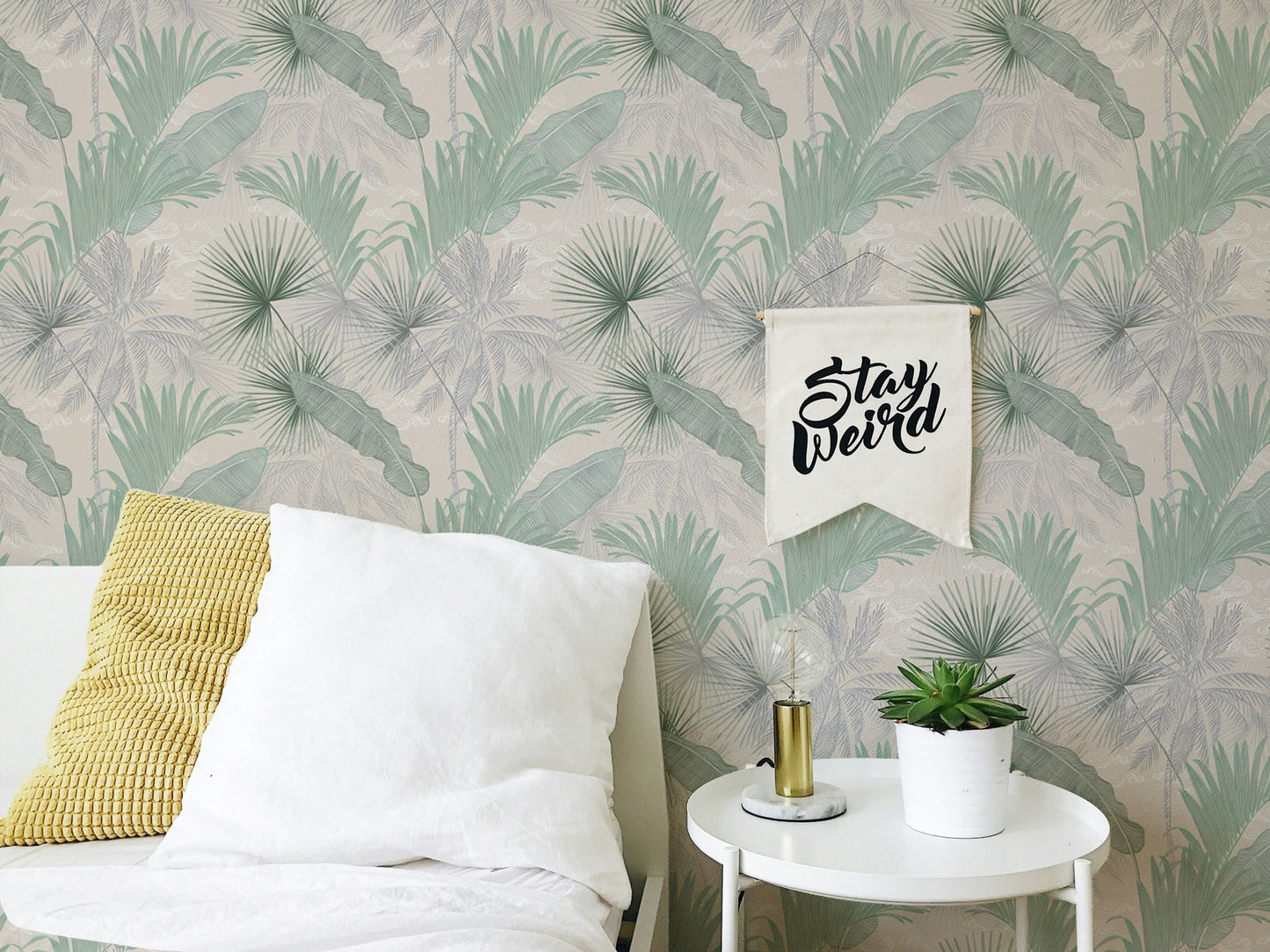 Green Banana Leaves Seamless Pattern Wallpaper in a bedroom with white bedding.