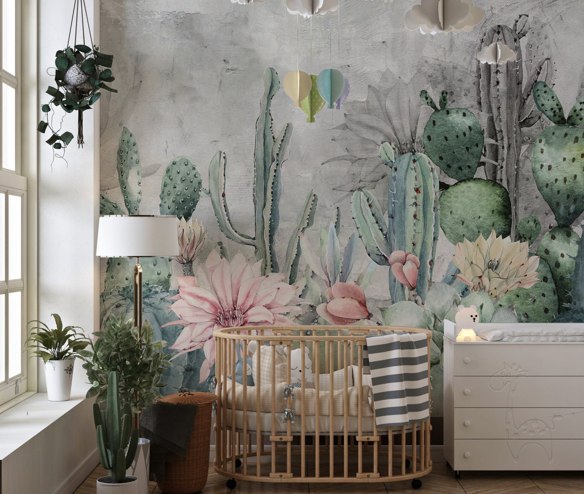 Desert cactus wall mural in modern nursery with baby cot