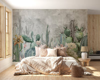 Neutral bedroom design with green cactus wall mural.