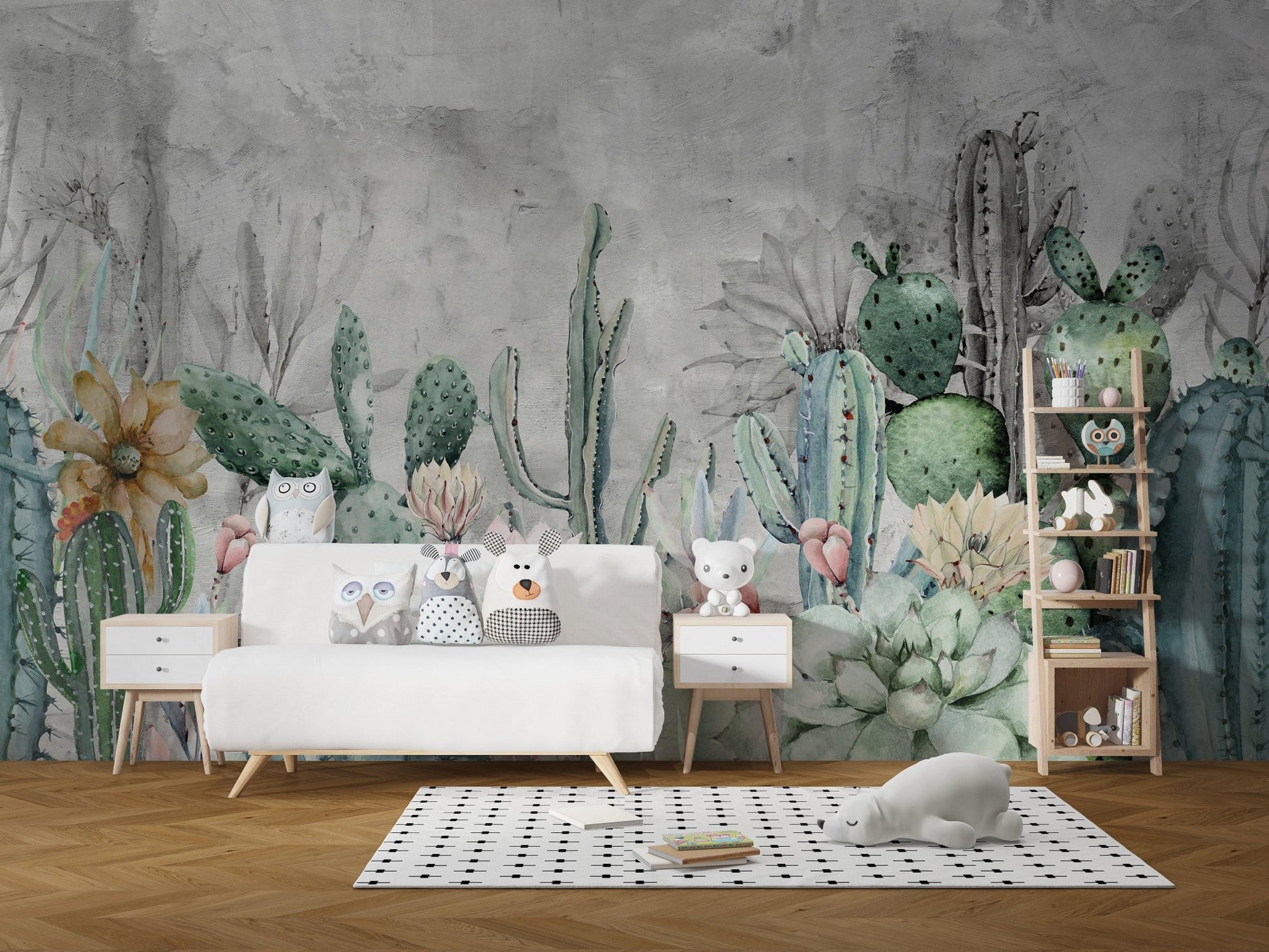 Grey wall mural with green cacti behind white sideboard in kids room.