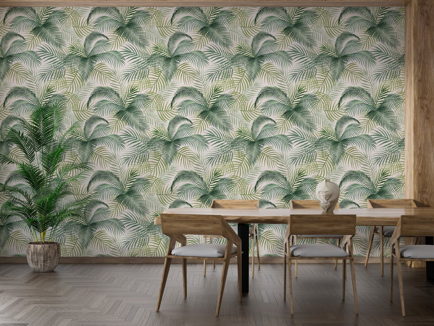 Palm frond wallpaper in a dining area featuring a wooden table and chairs.
