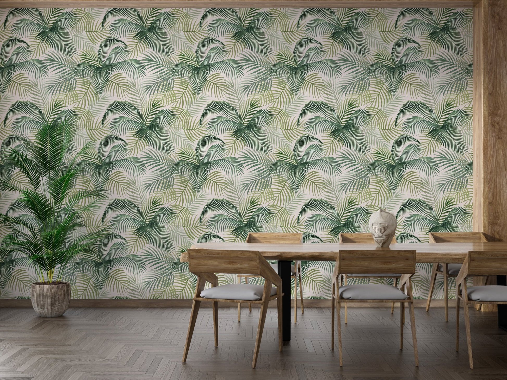 Palm frond wallpaper in a dining area featuring a wooden table and chairs.