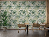 Palm frond wallpaper in a dining area featuring a wooden table and chairs.