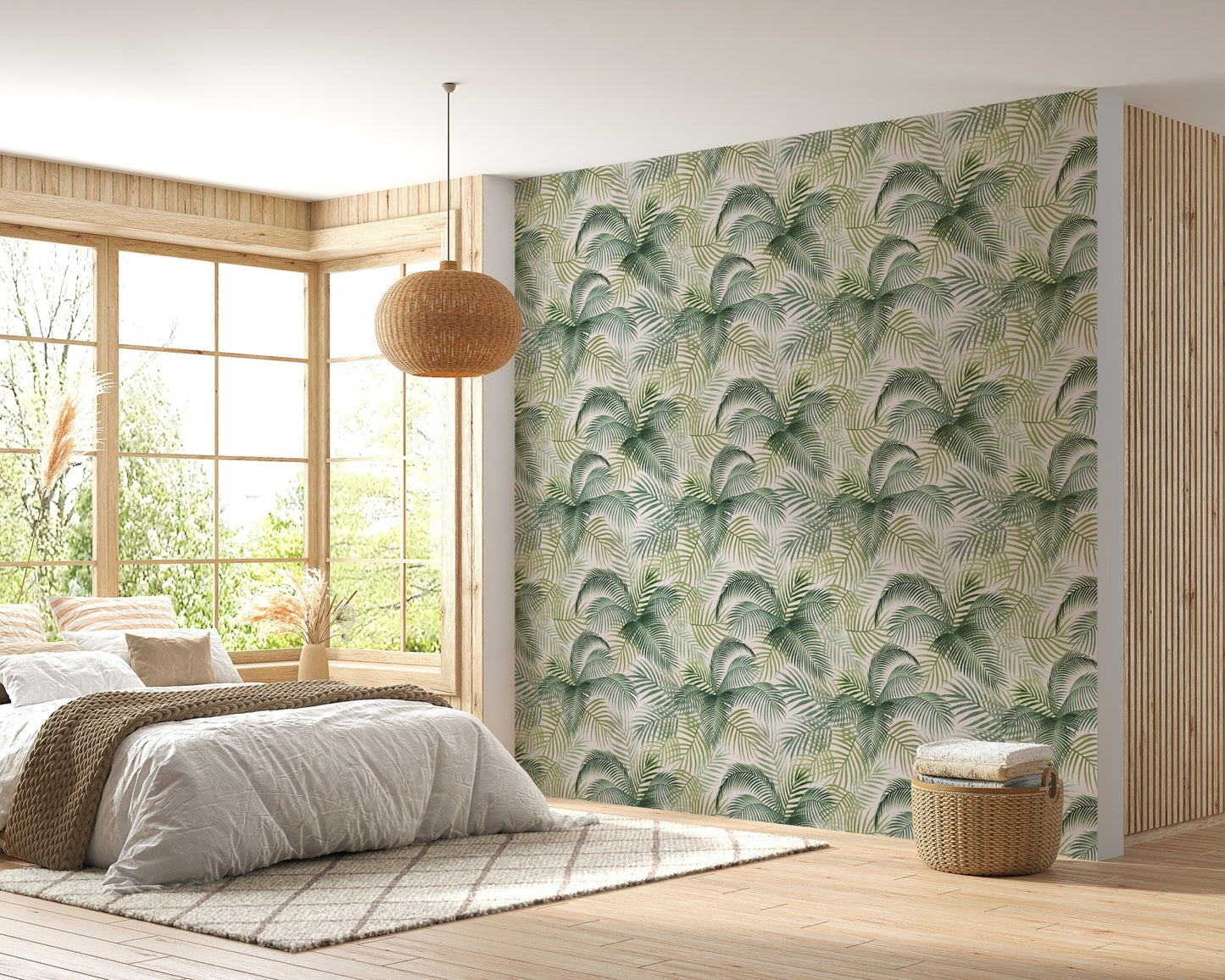 Leafy repeat pattern wallpaper in a bright bedroom with a rattan pendant light.