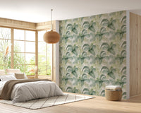 Leafy repeat pattern wallpaper in a bright bedroom with a rattan pendant light.