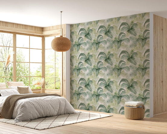 Leafy repeat pattern wallpaper in a bright bedroom with a rattan pendant light.
