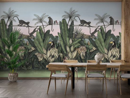 Dining room setting with wooden furniture and a large jungle wall mural backdrop.
