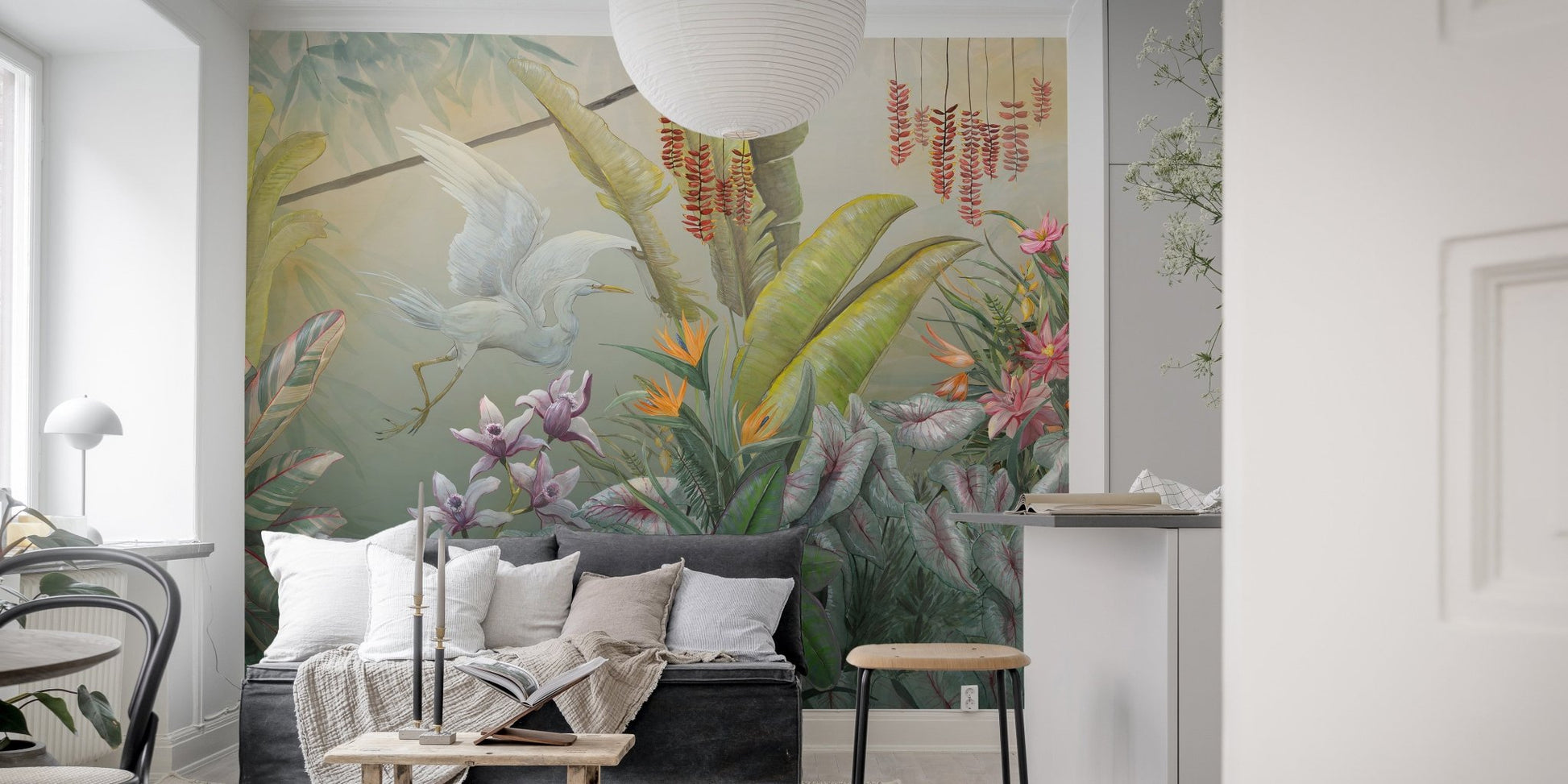 Green Plants & Flowers Wall Mural behind a black sofa in a narrow room.