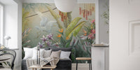 Green Plants & Flowers Wall Mural behind a black sofa in a narrow room.