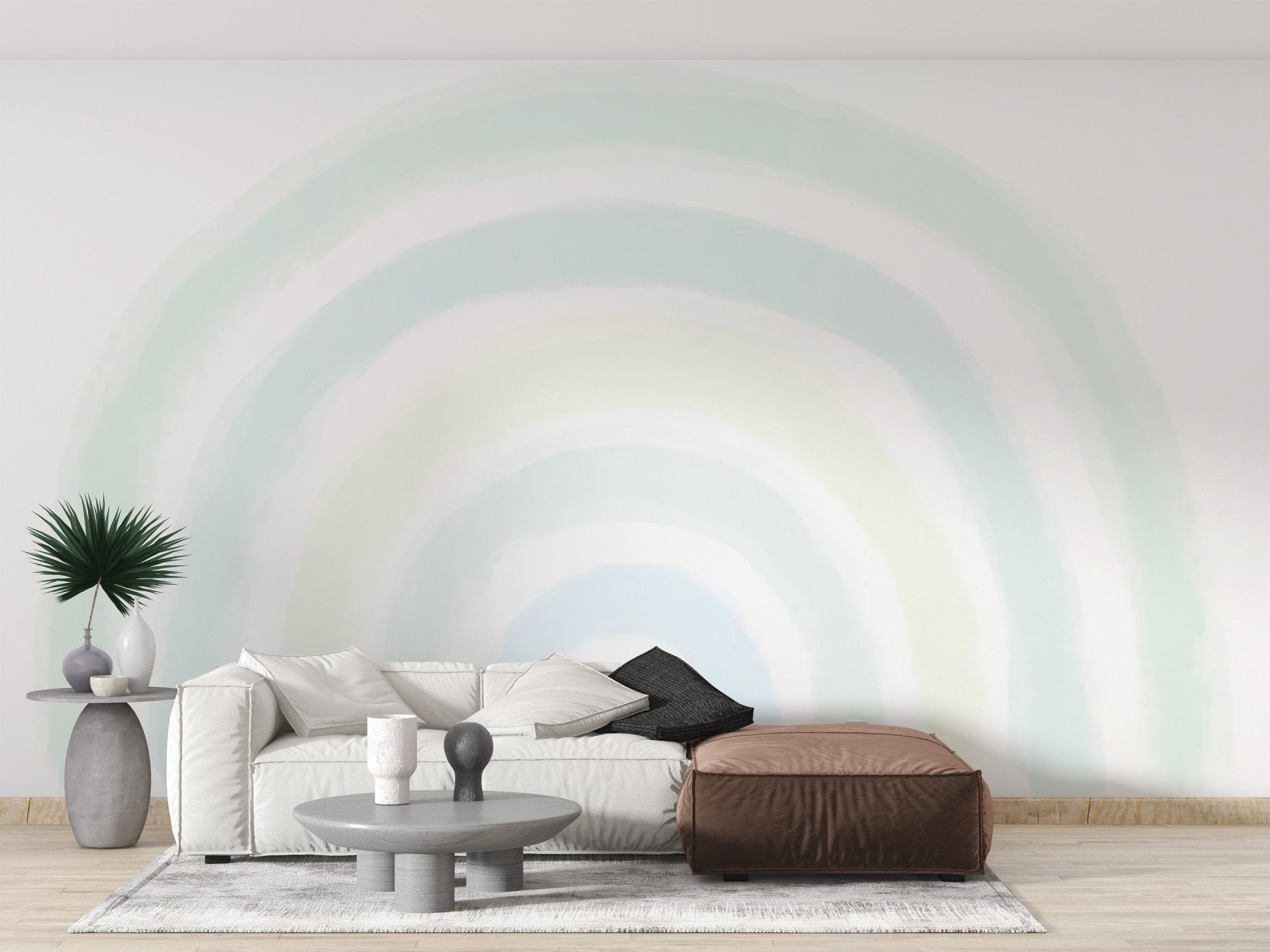 Neutral gender wall mural with layered pastel green and cream arches.