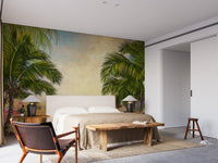Palm tree wall mural in a master bedroom with a wooden bench and white bed.