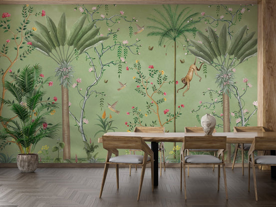 Sage green botanical wallpaper featuring hand-painted monkeys and exotic birds mural.