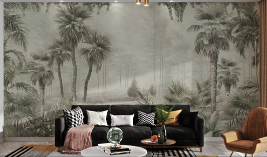 Tropical trees and leaves wall mural in soft green tones for living room.