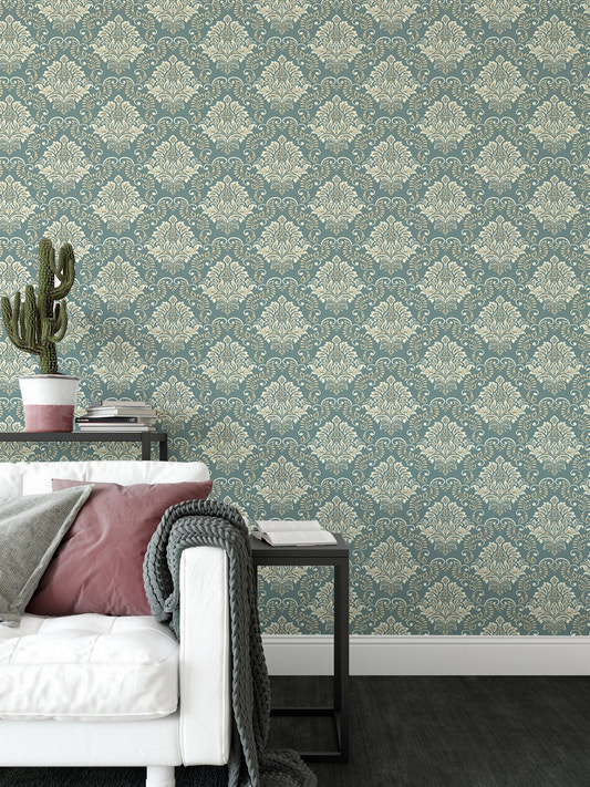 Green Vintage Baroque Damask Design Wallpaper in a living room with a white sofa.