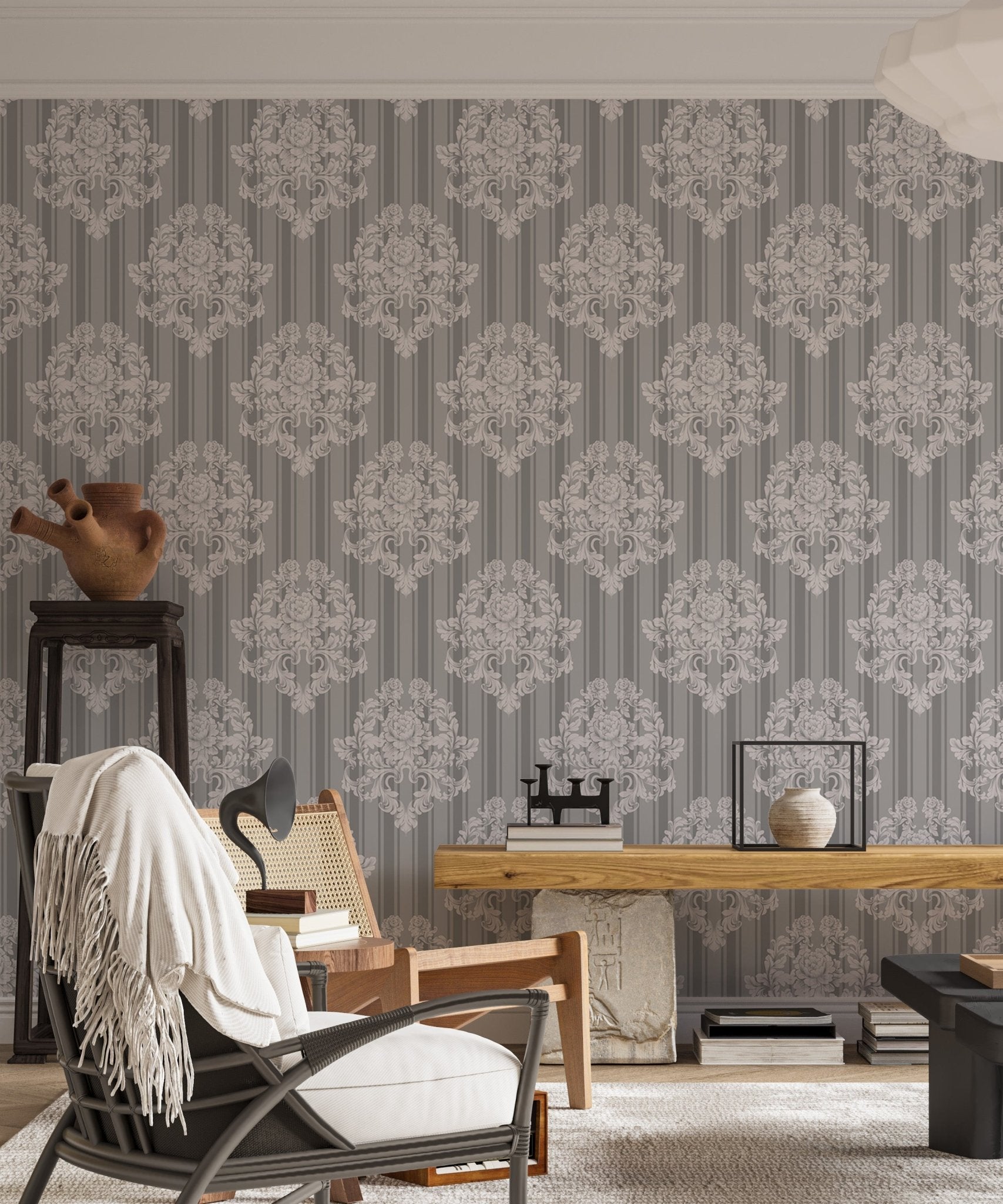 Vintage damask wallpaper in a home office with a wooden desk.