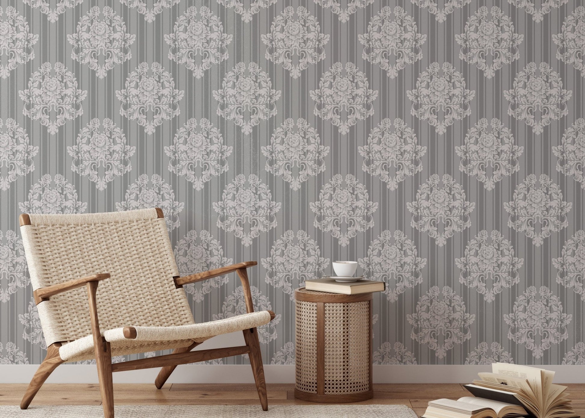 Grey damask wallpaper in a reading area with a woven chair.