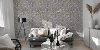 Grey floral wallpaper as a backdrop for a contemporary living room sofa.