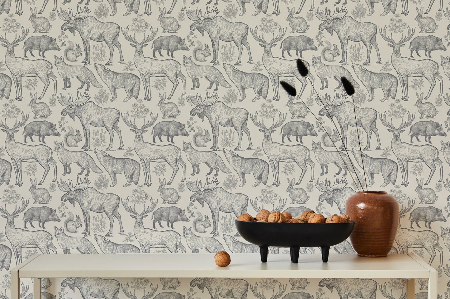 Stylish removable wallpaper with animals and botanical elements in minimalist hallway.