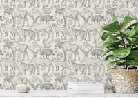 Removable wallpaper with grey animal and plant patterns in study space.