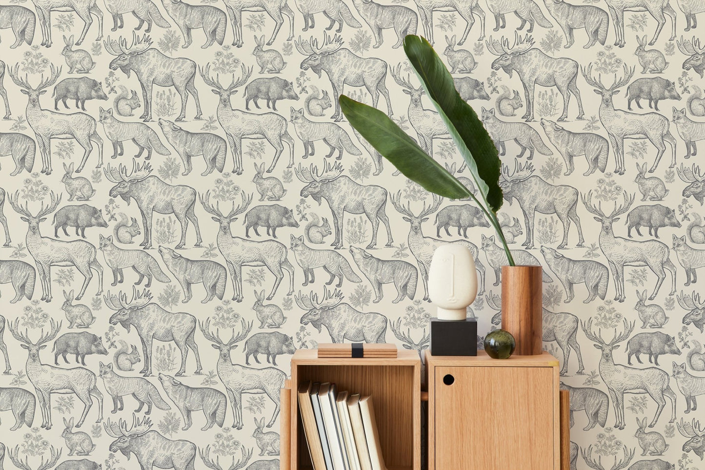 Sophisticated wallpaper with grey animals and foliage in modern living space.