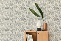 Sophisticated wallpaper with grey animals and foliage in modern living space.