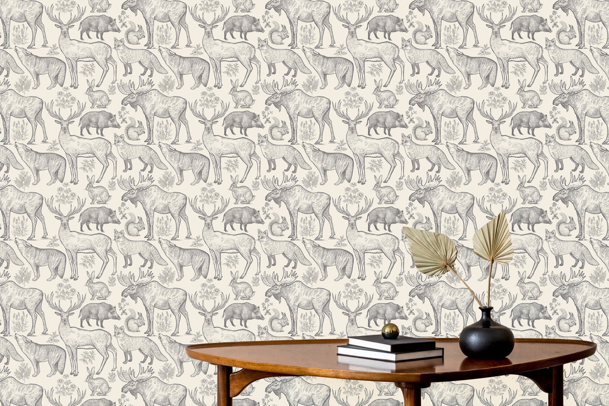 Entryway wall featuring detailed animal sketches on a grey color wallpaper.