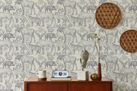 Removable wallpaper in grey tones with nature motifs for reading space.