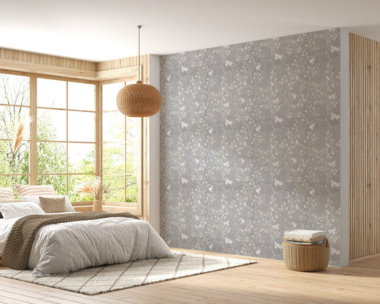 Modern apartment living room styled with a grey floral bird wallpaper.