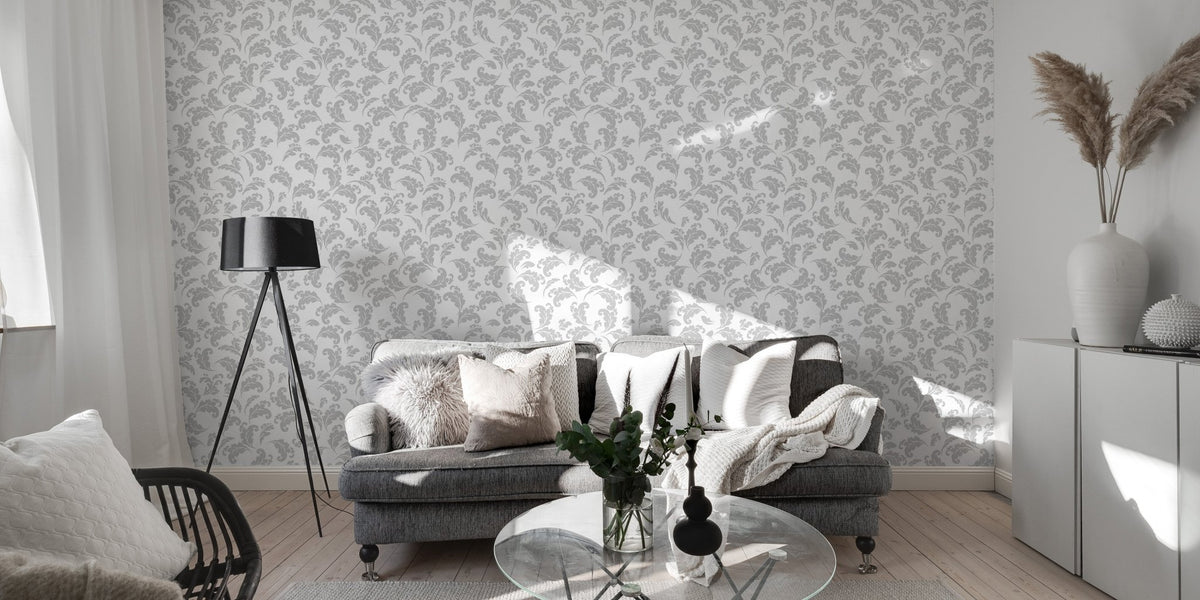 Repeating leaf pattern wallpaper in a sunlit room with wooden floors.