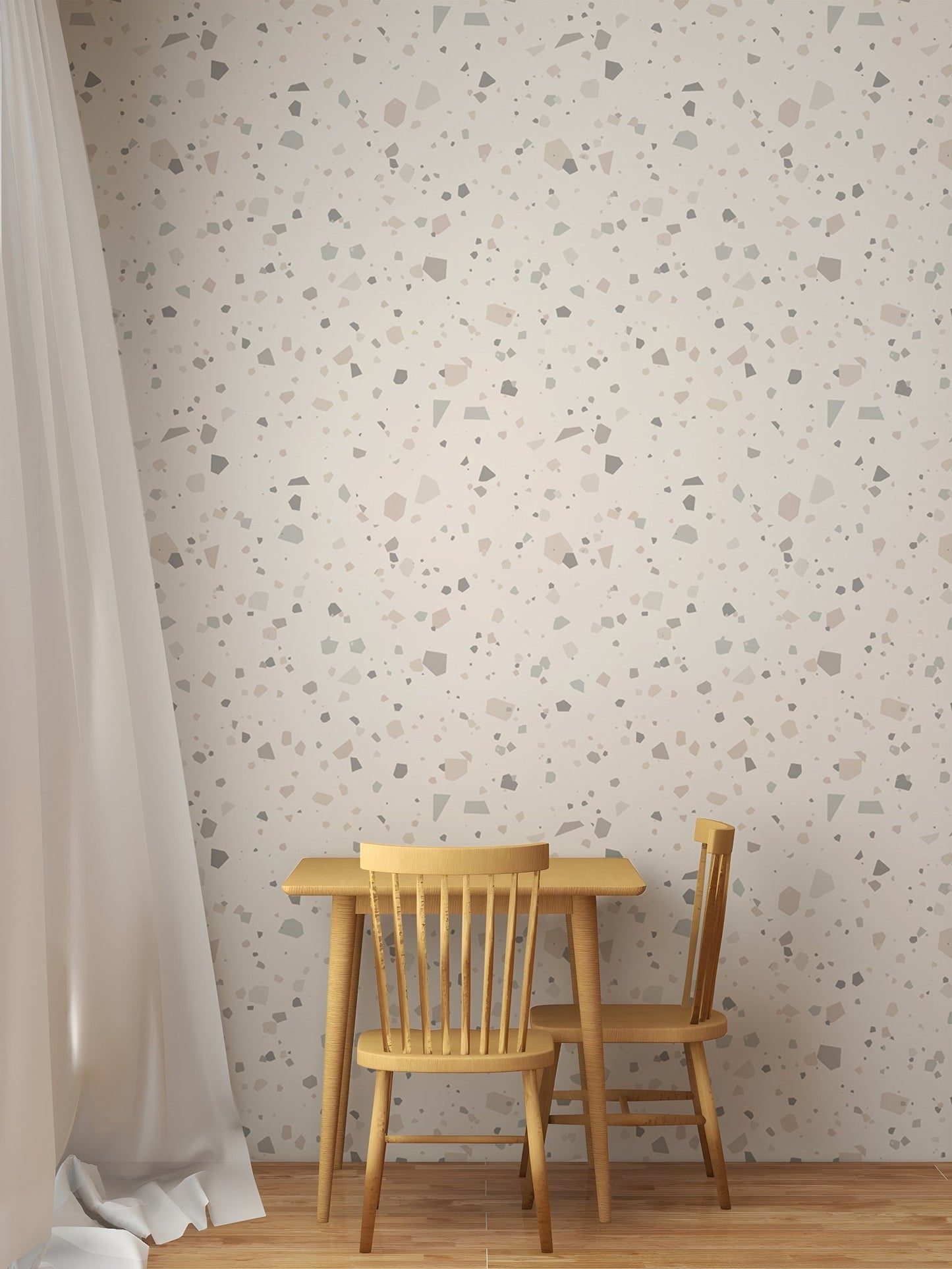Terrazzo wall mural in a dining nook with a small wooden table and chairs.